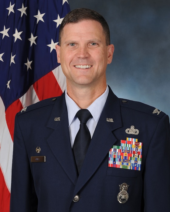 Official photo of Col Aaron Guill