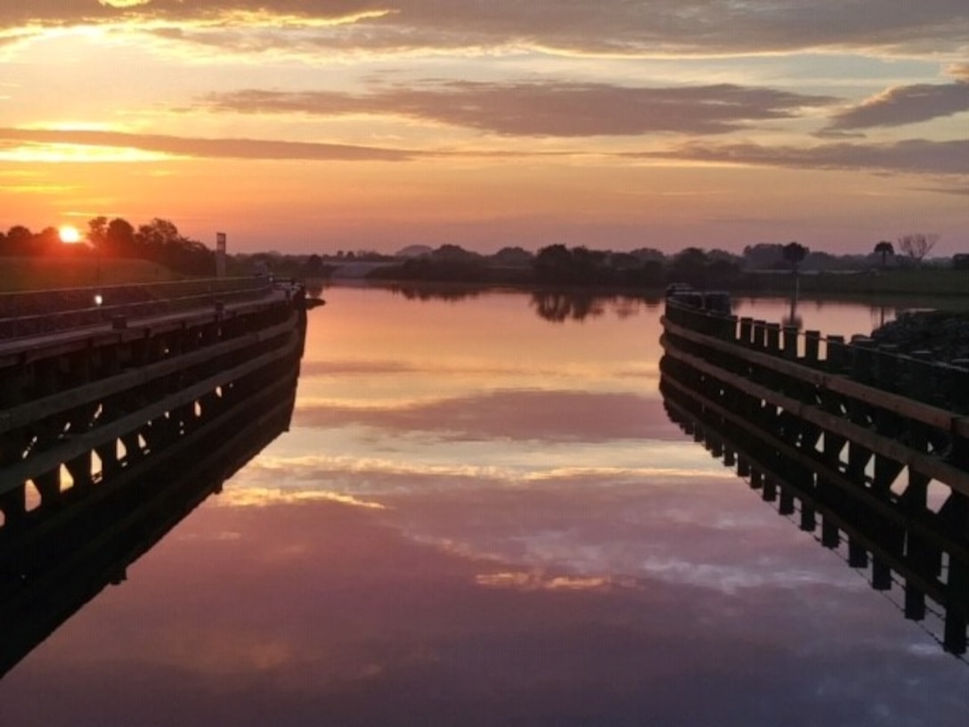 The Corps team arrives on site before sunrise to begin dewatering the Ortona Lock.