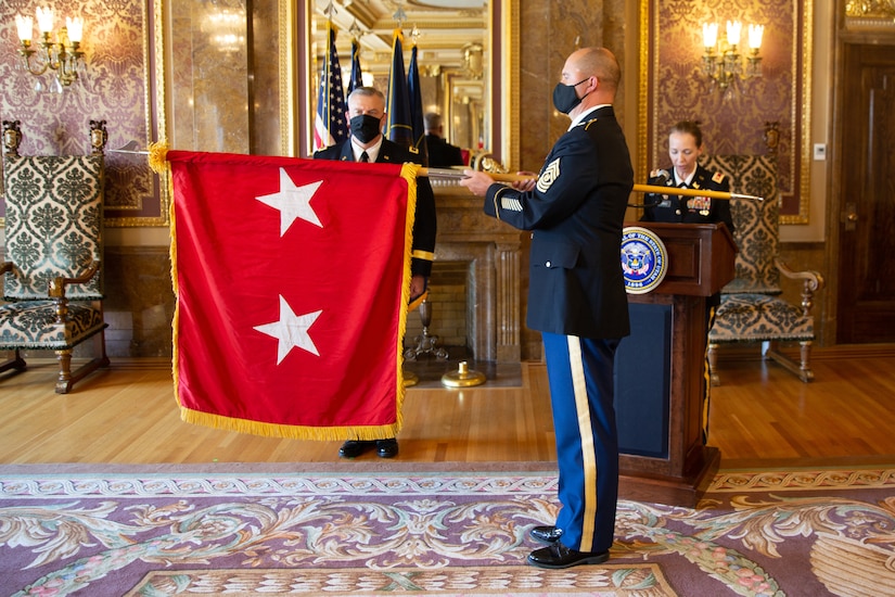 Command Sgt. Maj. Spencer Nielsen unfurled and posted the two-star flag followed by offering the first salute to the newly promoted Adjutant General, Maj. Gen.  Michael J. Turley Aug. 6, 2020.