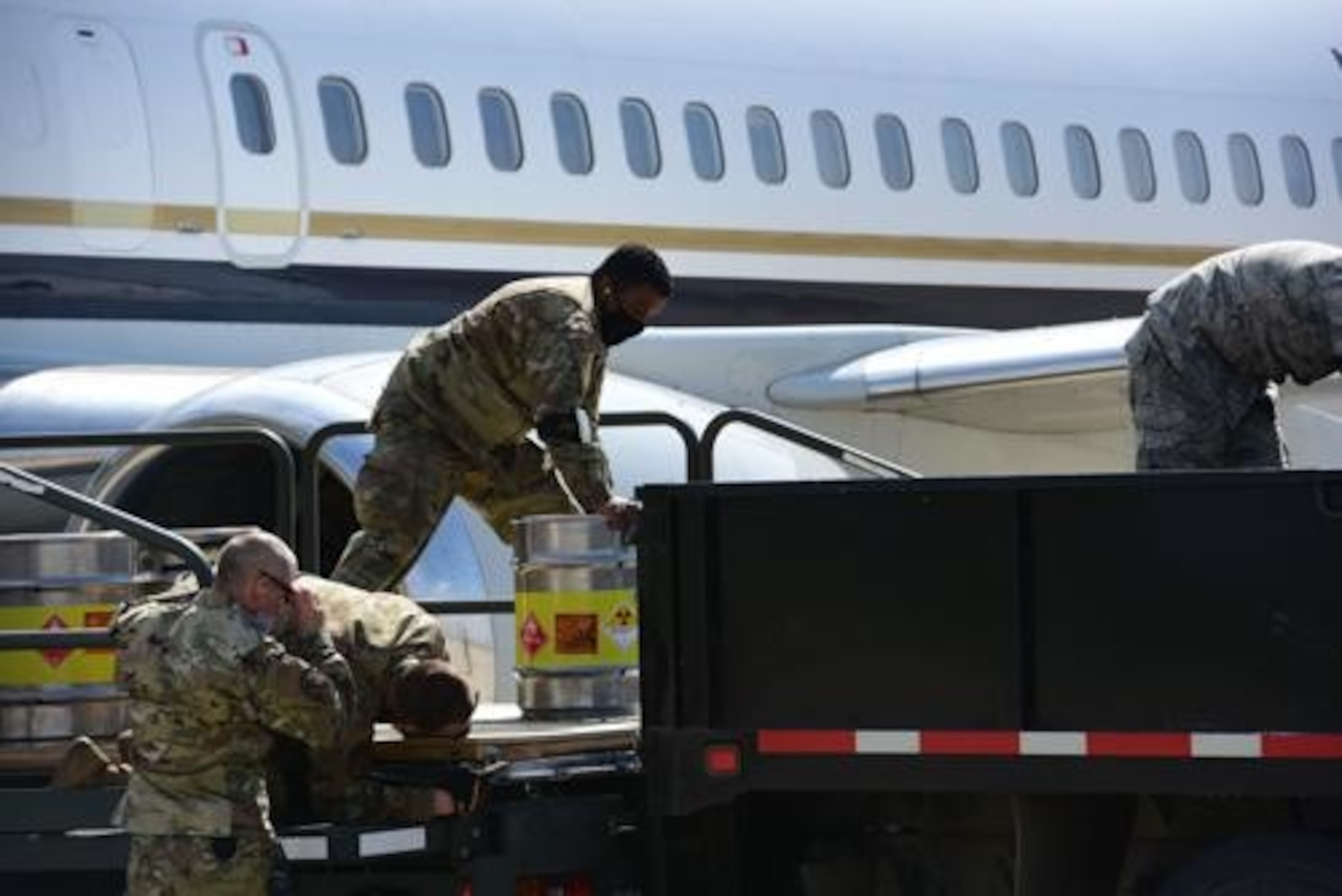 An Airman from the 5th Logistics Readiness Squadron hauls cargo at Minot Air Force Base, North Dakota, May 20, 2020. The 5th LRS modified pallets with rollers in order to efficiently change the way they work missions. (U.S. Air Force photo by Senior Airman Dillon Audit)