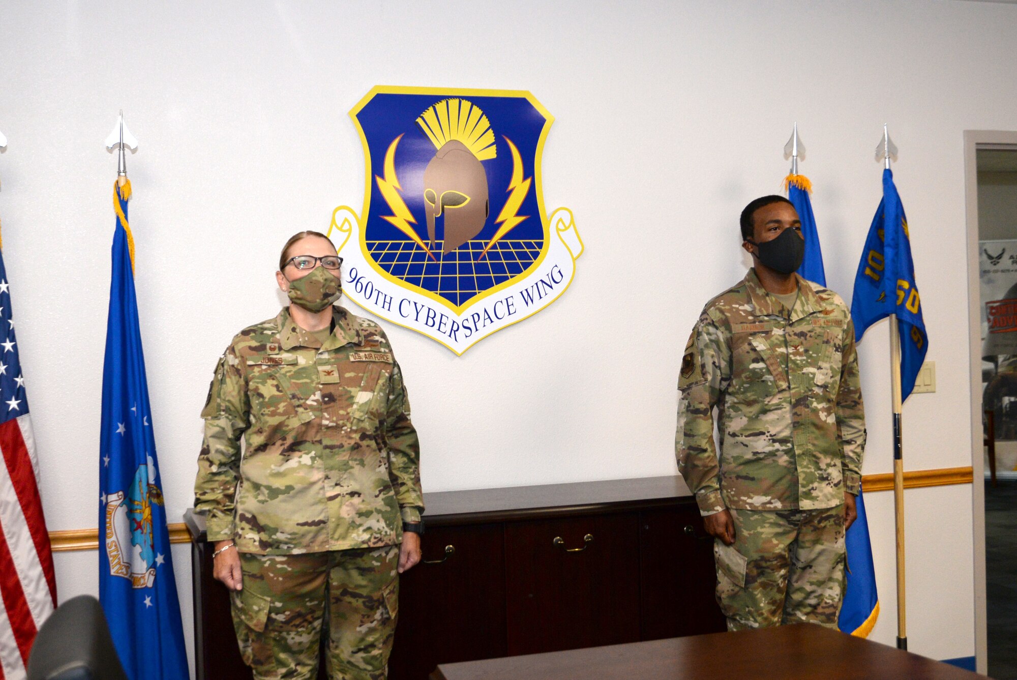 Col. Silas Darden, 960th Cyberspace Wing vice commander, is presented with the Legion of Merit by Col. Lori Jones, 960th CW commander, Aug. 8, 2020, at Joint Base San Antonio-Chapman Training Annex, Texas. (U.S. Air Force photo by Samantha Mathison)
