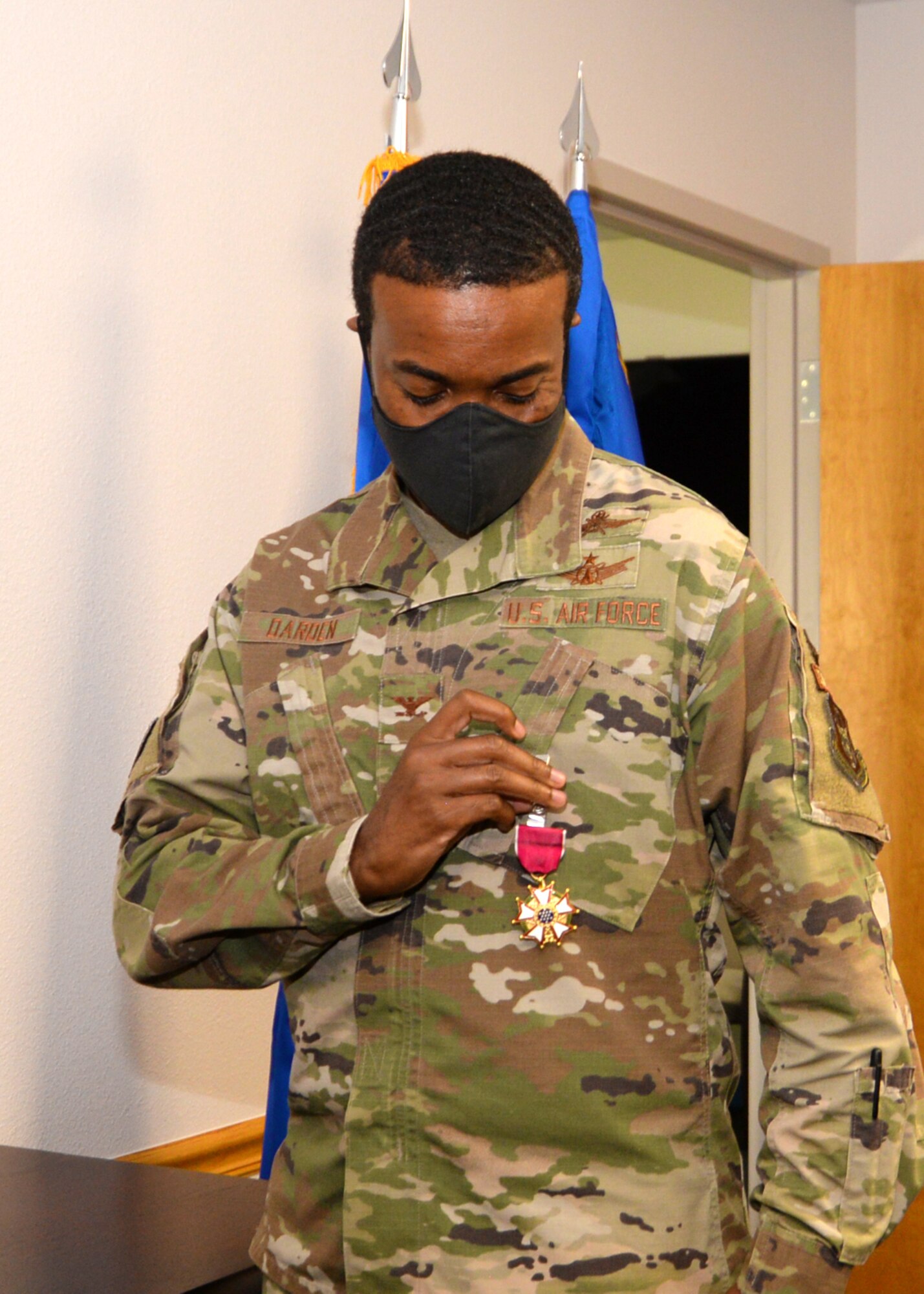 Col. Silas Darden, 960th Cyberspace Wing vice commander, is presented with the Legion of Merit by Col. Lori Jones, 960th CW commander, Aug. 8, 2020, at Joint Base San Antonio-Chapman Training Annex, Texas. (U.S. Air Force photo by Samantha Mathison)