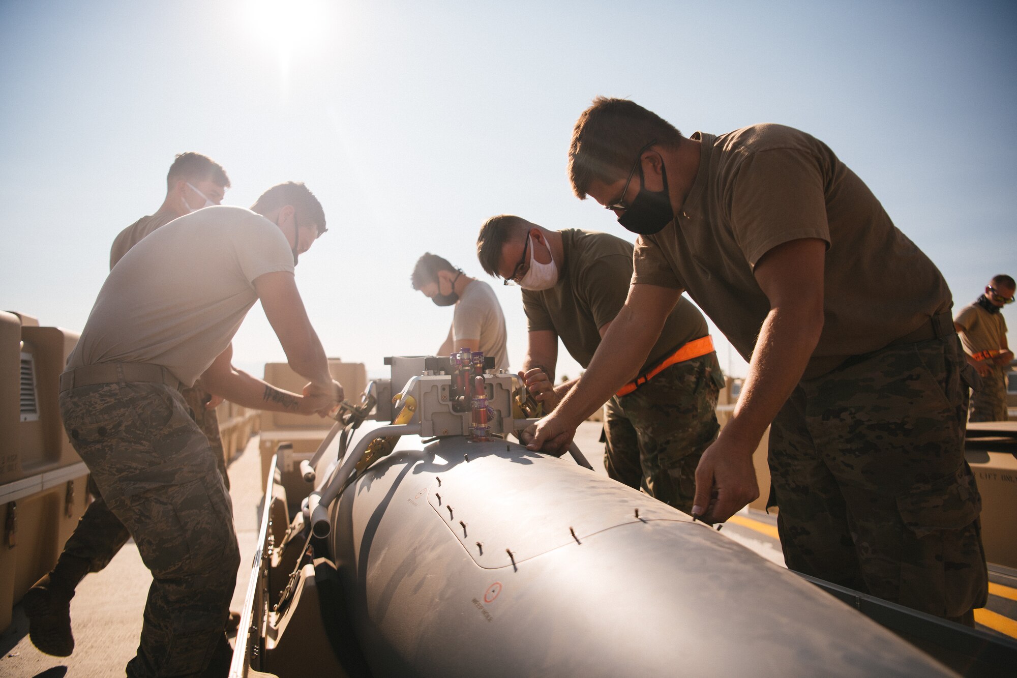Several Airmen from the 432nd Aircraft Maintenance Squadron