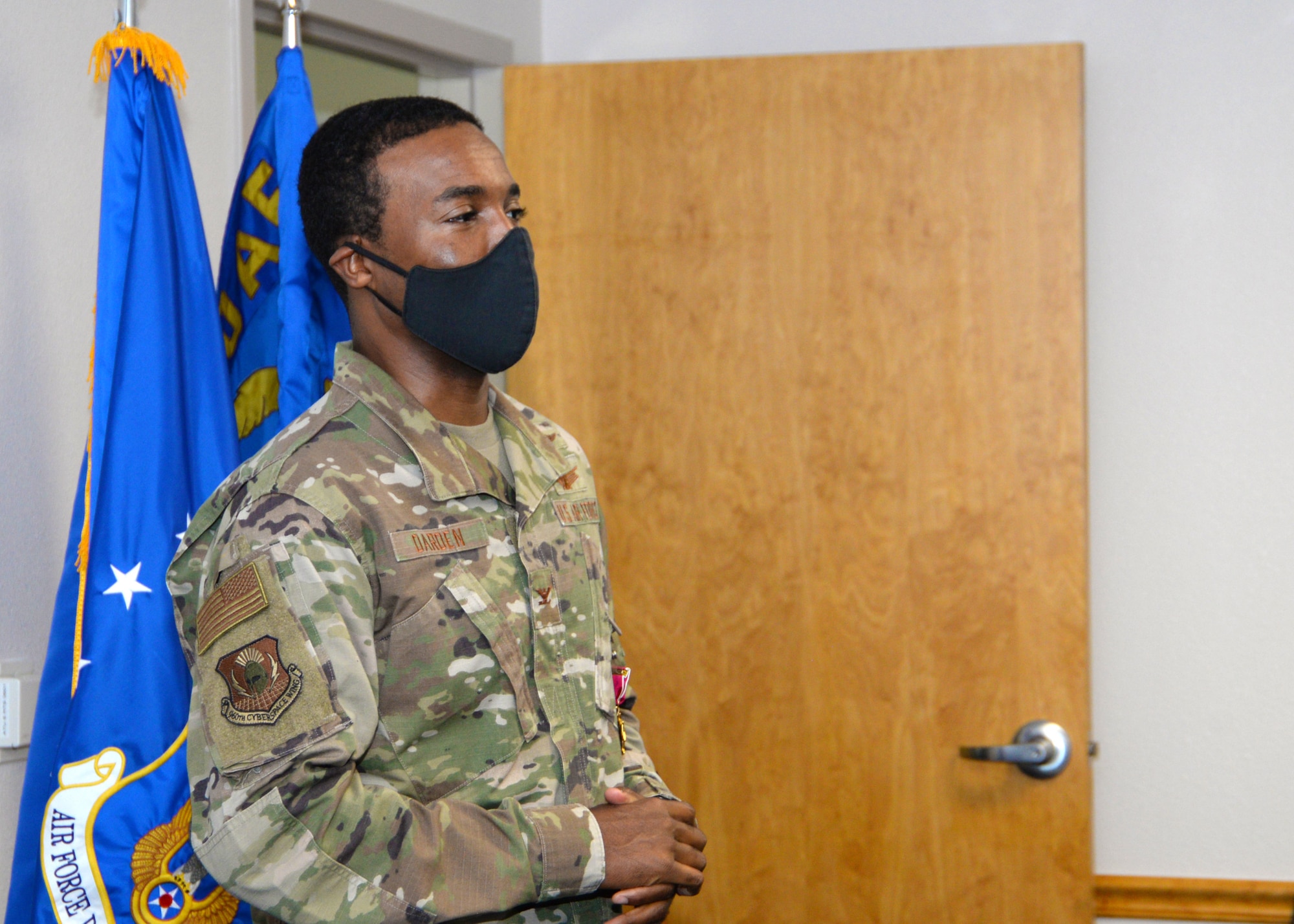 Col. Silas Darden, 960th Cyberspace Wing vice commander, is presented with the Legion of Merit by Col. Lori Jones, 960th CW commander, Aug. 8, 2020, at Joint Base San Antonio-Chapman Training Annex, Texas. (U.S. Air Force photo by Samantha Mathison)