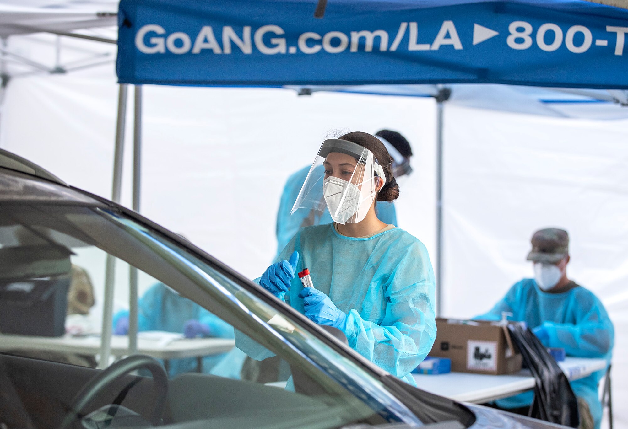 159th Medical Group perform COVID-19 testing with local and state partners.