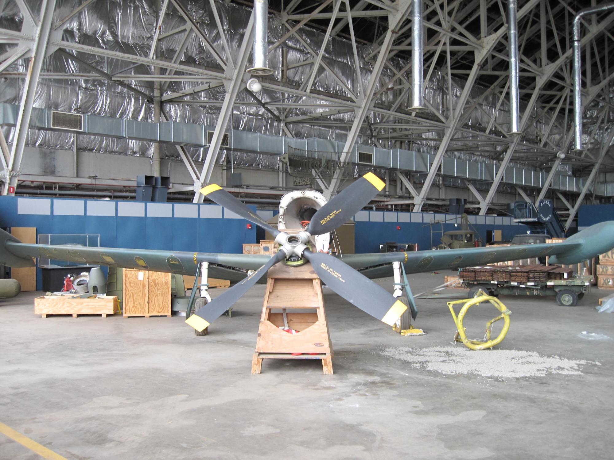 Picture of Piper PA-48E disassembled in storage hangar.