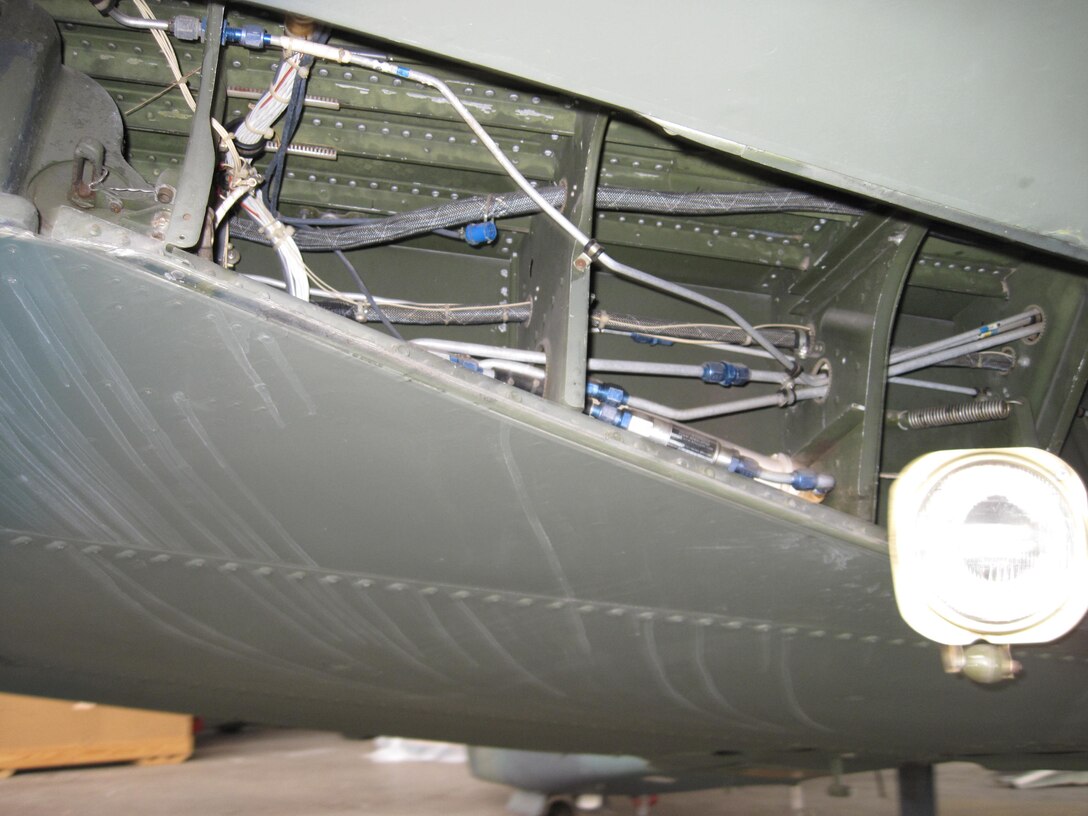 Picture of Piper PA-48E disassembled in storage hangar.