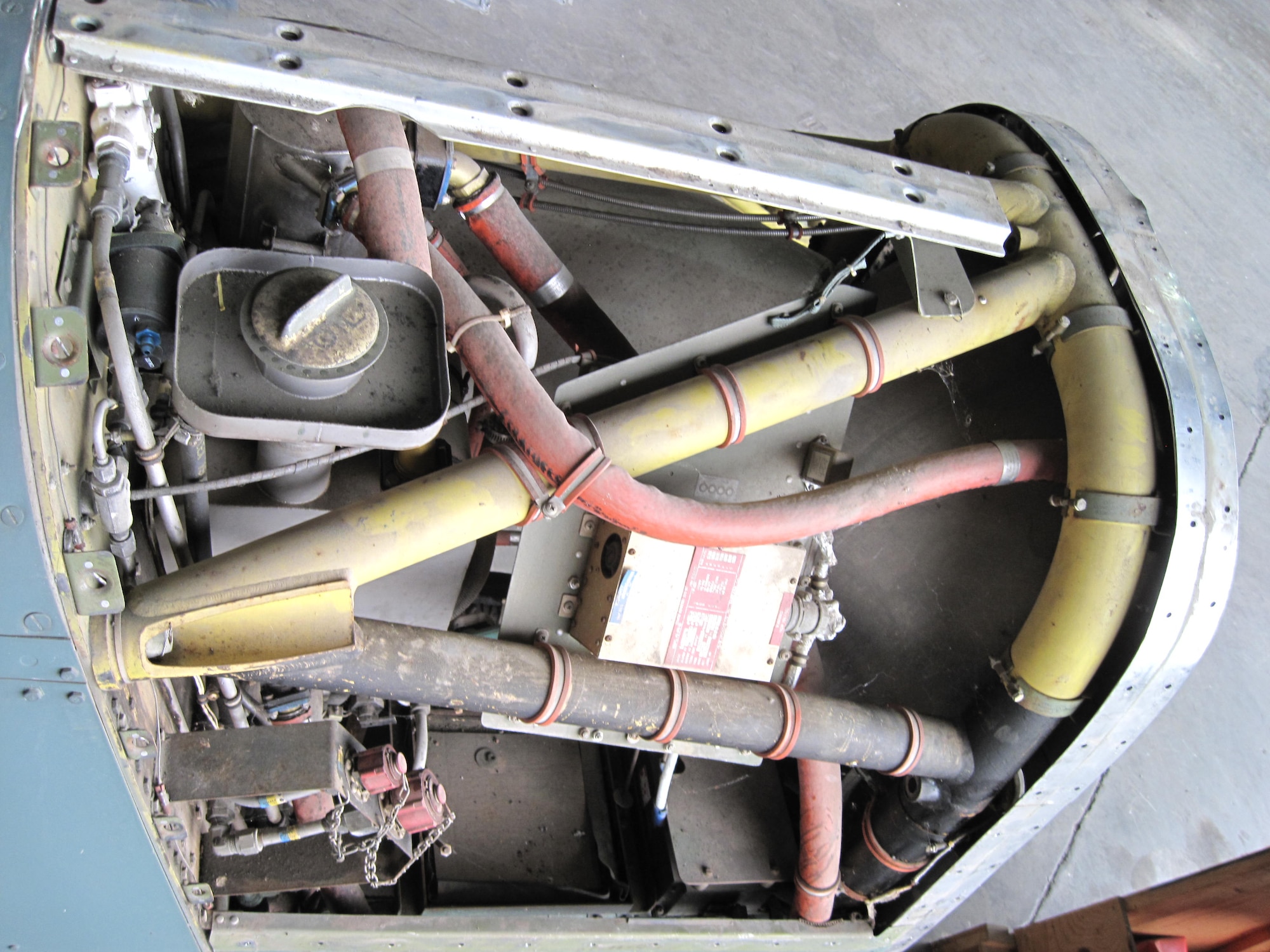 Picture of Piper PA-48E disassembled in storage hangar.