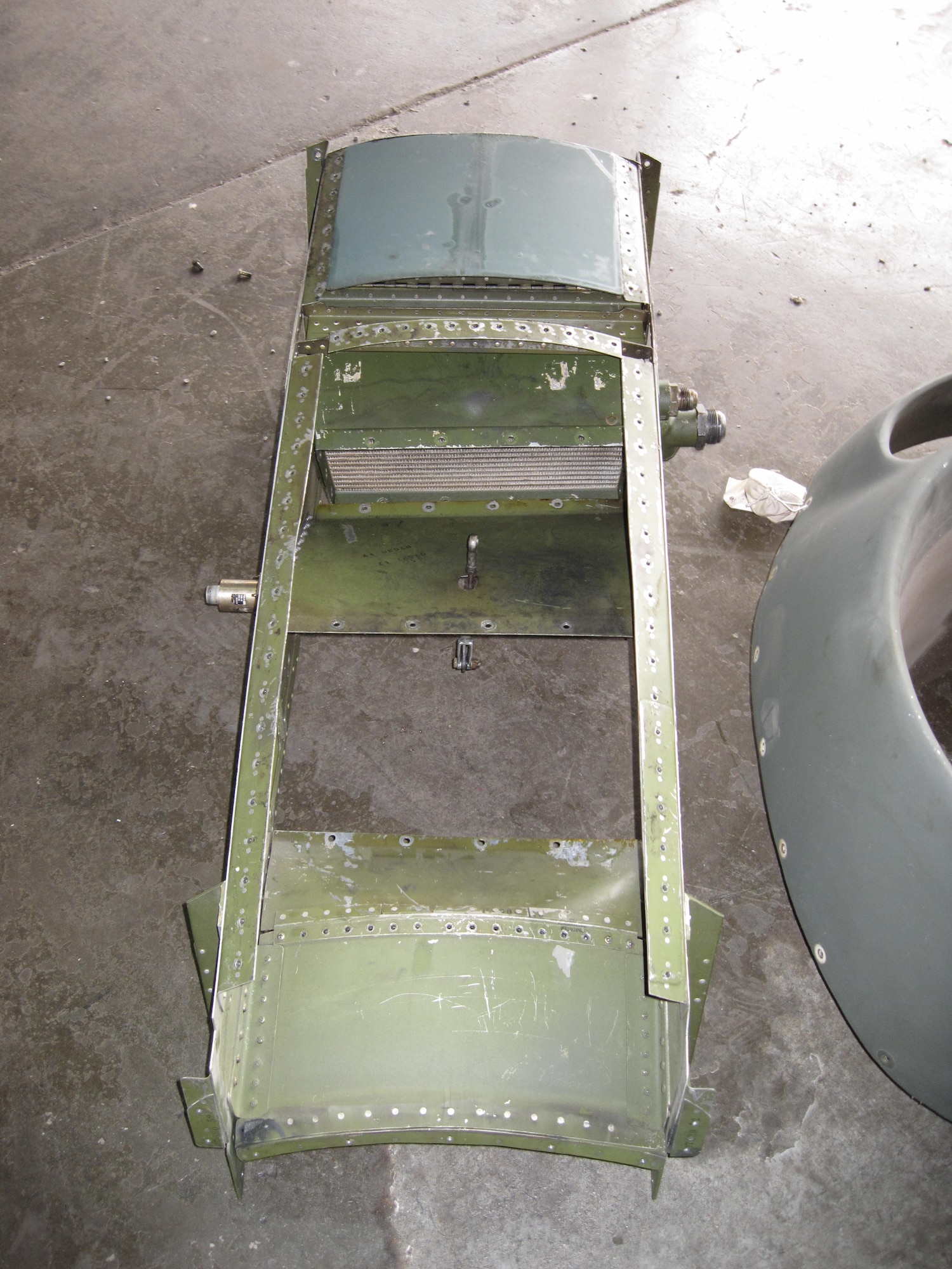 Picture of Piper PA-48E disassembled in storage hangar.