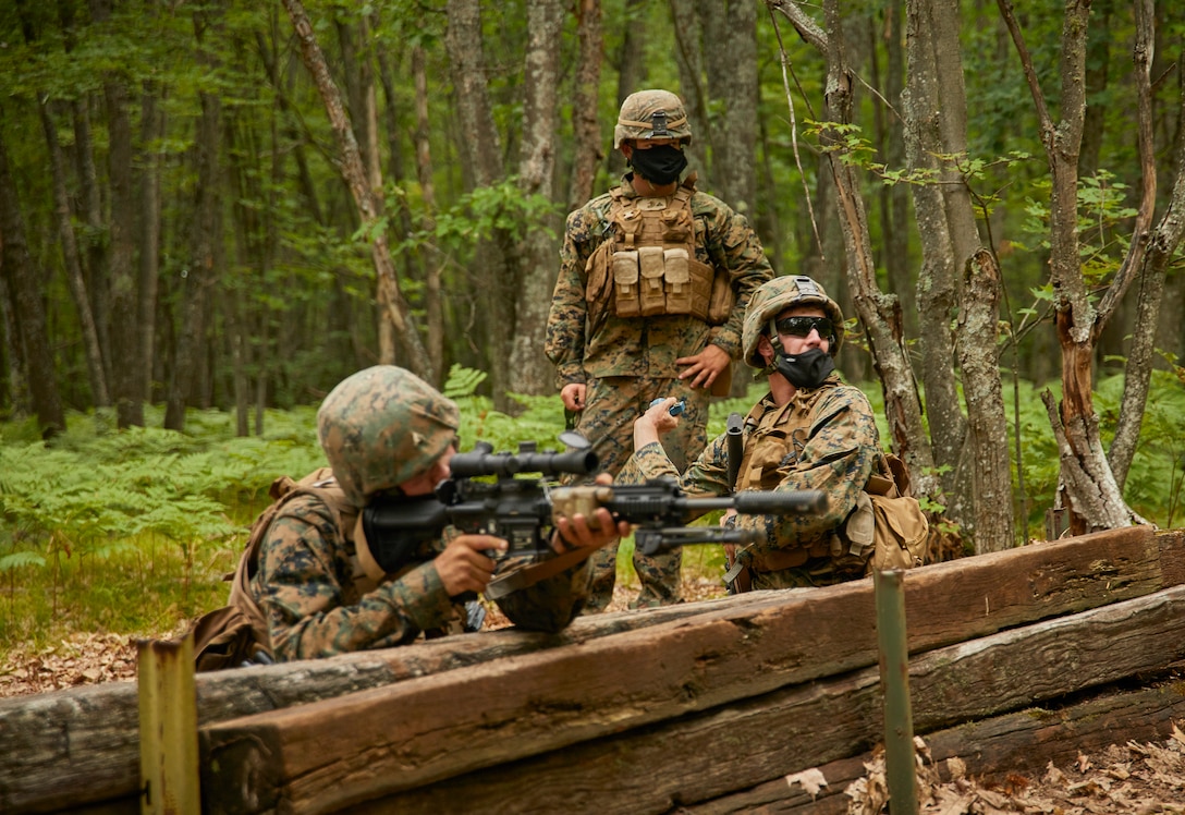 Marines with Bravo Company, 1st Battalion, 24th Marine Regiment, 4th Marine Division, practice launching blue-body colored dummy grenades at simulated enemy mortar positions at Camp Grayling, Mich., Aug. 10, 2020. This training is included in the Marine's annual training and readiness manual, which gives guidance on the equipment, ammunition, ranges and support requirements to plan and execute effective training to increase Marines’ lethality. (U.S. Marine Corps photo by Lance Cpl. Leslie Alcaraz)