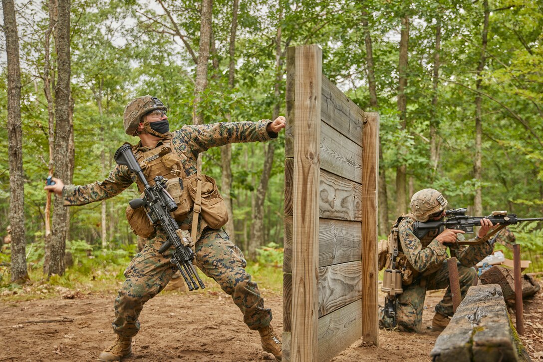 Marines with Bravo Company, 1st Battalion, 24th Marine Regiment, 4th Marine Division, practice launching blue-body colored dummy grenades at simulated enemy mortar positions at Camp Grayling, Mich., Aug. 10, 2020. This training is included in the Marine's annual training and readiness manual, which gives guidance on the equipment, ammunition, ranges and support requirements to plan and execute effective training to increase Marines’ lethality. (U.S. Marine Corps photo by Lance Cpl. Leslie Alcaraz)