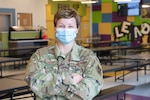 U.S. Air National Guard Senior Master Sgt. Cami Glasgow helped the Missouri National Guard package meals for the summer school food service program at the Cameron Veterans Middle School in Cameron, Missouri, July 31, 2020.