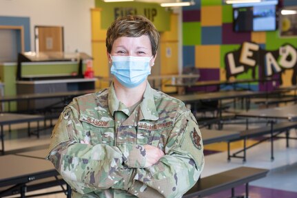 U.S. Air National Guard Senior Master Sgt. Cami Glasgow helped the Missouri National Guard package meals for the summer school food service program at the Cameron Veterans Middle School in Cameron, Missouri, July 31, 2020.