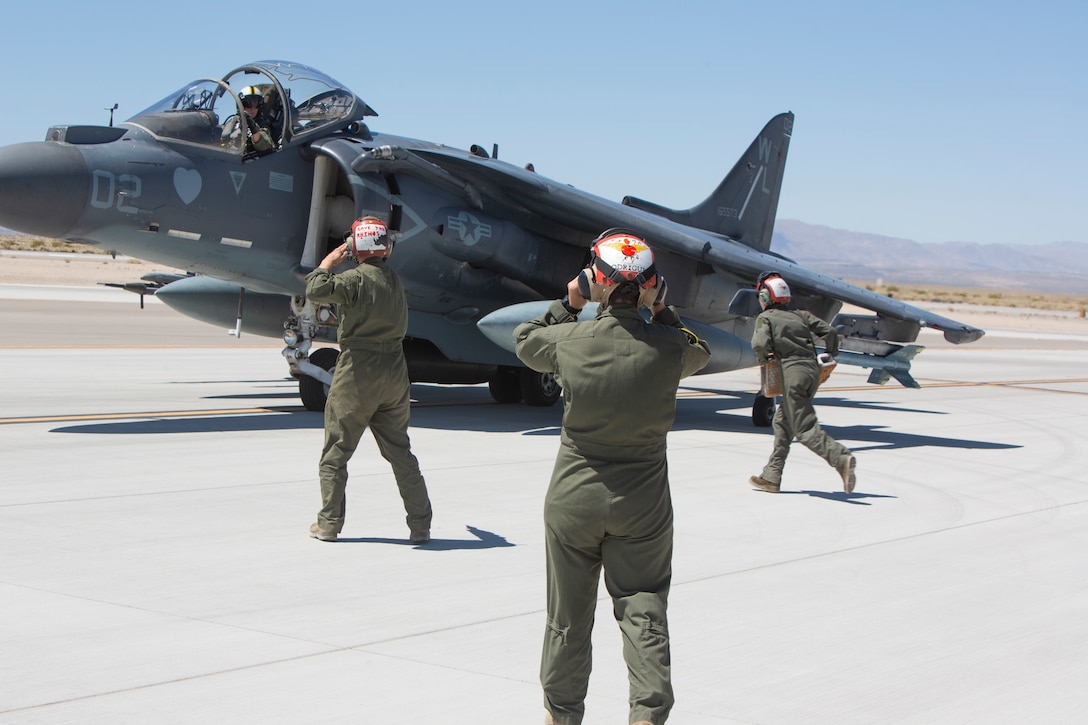U.S. Marines conduct hot brake procedures on an AV-8B Harrier during Exercise Summer Fury 20 at Naval Air Weapons Station China Lake, Calif., July 31.