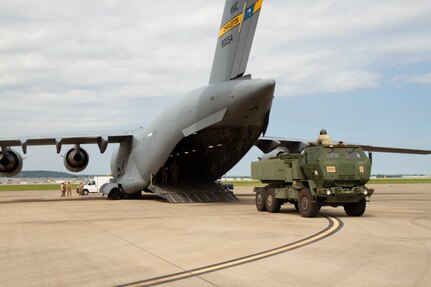 Kentucky National Guard Soldiers from 623rd Field Artillery Battalion loaded High Mobility Artillery Rocket Systems onto a C-17 as apart of a rapid infiltration mission for their annual certification and training at the Louisville Air National Guard Base in Louisville, Ky., Aug. 6, 2020. Soldiers and Airmen worked together to pull off the successful mission.