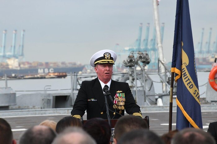 After 40 years of faithful service, U.S. Navy Cmdr. Coy Adams bids farewell to his friends and colleagues in a retirement ceremony aboard the USS Wisconsin Oct. 25. (U.S. Navy photo by Interior Communication Electrician 3rd Class Kaelyn Hernandez)
