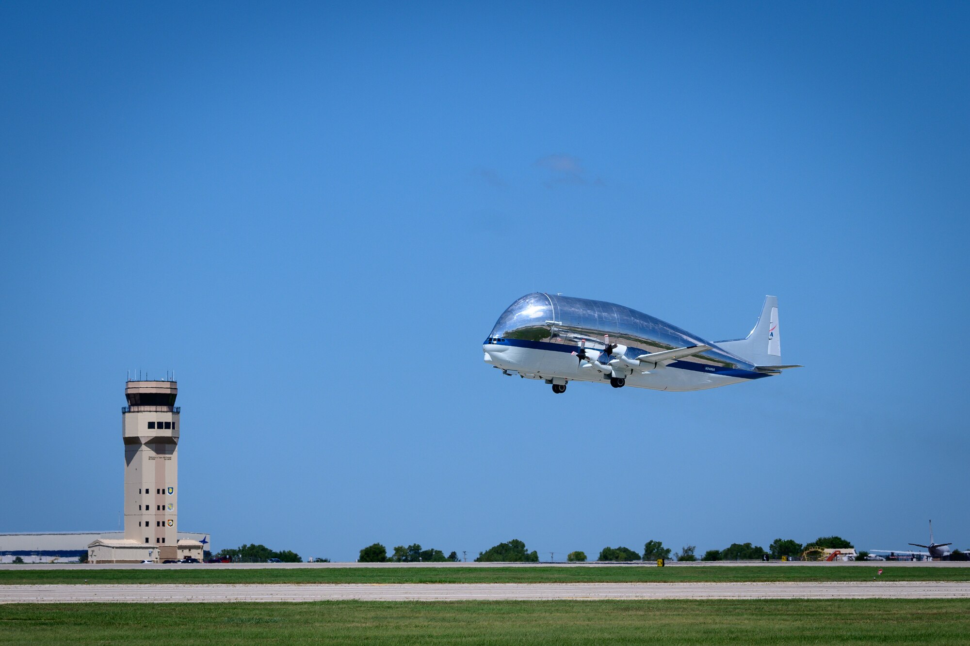 NASA’s Super Guppy takes off Aug. 11, 2020, at McConnell Air Force Base, Kansas. The Super Guppy’s cargo area is 25 feet wide, 25 feet tall and 111 feet long, enabling the aircraft to carry items that might otherwise be impossible to ship via land or sea. (U.S. Air Force photo by Senior Airman Michaela R. Slanchik)