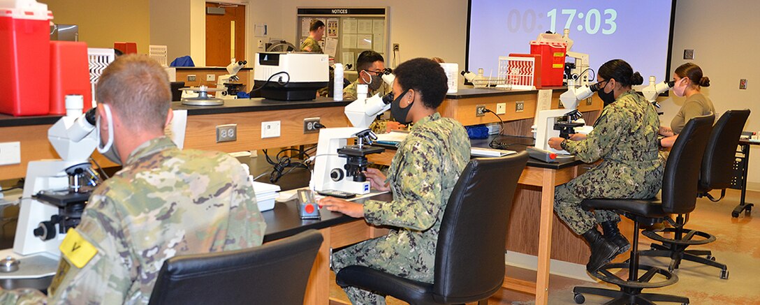 The Medical Education and Training Campus (METC) continues to train the world's finest Medics, Corpsmen, and Technicians - like these students in the physical therapy technician program - with extra safety precautions in place.