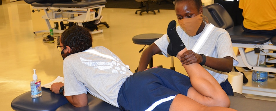 The Medical Education and Training Campus (METC) continues to train the world's finest Medics, Corpsmen, and Technicians - like these students in the physical therapy technician program - with extra safety precautions in place.