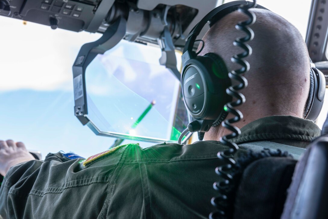 Reserve members of the 327th Airlift Squadron fly in a low level formation route along Greers Ferry Lake, Ark. on Aug. 1, 2020. This was the first in-person training event for the 913th Airlift Group since COVID-19 swept across the U.S. Using health precaution measures, reserve members were able to restore readiness while mitigating health risks, ensuring no COVID-19 cases were transmitted among members over the weekend. The majority of our Reserve members have to meet the same requirements of Active Duty personnel. This means they have to balance a full-time civilian job or college studies while maintaining their military readiness. (U.S. Air Force Reserve photo by Maj. Ashley Walker)