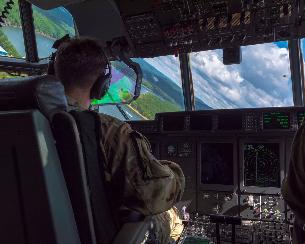 Reserve members of the 327th Airlift Squadron fly in a low level formation route along Greers Ferry Lake, Ark. on Aug. 1, 2020. This was the first in-person training event for the 913th Airlift Group since COVID-19 swept across the U.S. Using health precaution measures, reserve members were able to restore readiness while mitigating health risks, ensuring no COVID-19 cases were transmitted among members over the weekend. The majority of our Reserve members have to meet the same requirements of Active Duty personnel. This means they have to balance a full-time civilian job or college studies while maintaining their military readiness. (U.S. Air Force Reserve photo by Maj. Ashley Walker)