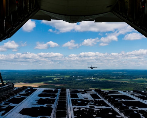 Reserve members of the 327th Airlift Squadron fly in a low level formation route along Greers Ferry Lake, Ark. on Aug. 1, 2020. This was the first in-person training event for the 913th Airlift Group since COVID-19 swept across the U.S. Using health precaution measures, reserve members were able to restore readiness while mitigating health risks, ensuring no COVID-19 cases were transmitted among members over the weekend. The majority of our Reserve members have to meet the same requirements of Active Duty personnel. This means they have to balance a full-time civilian job or college studies while maintaining their military readiness. (U.S. Air Force Reserve photo by Maj. Ashley Walker)