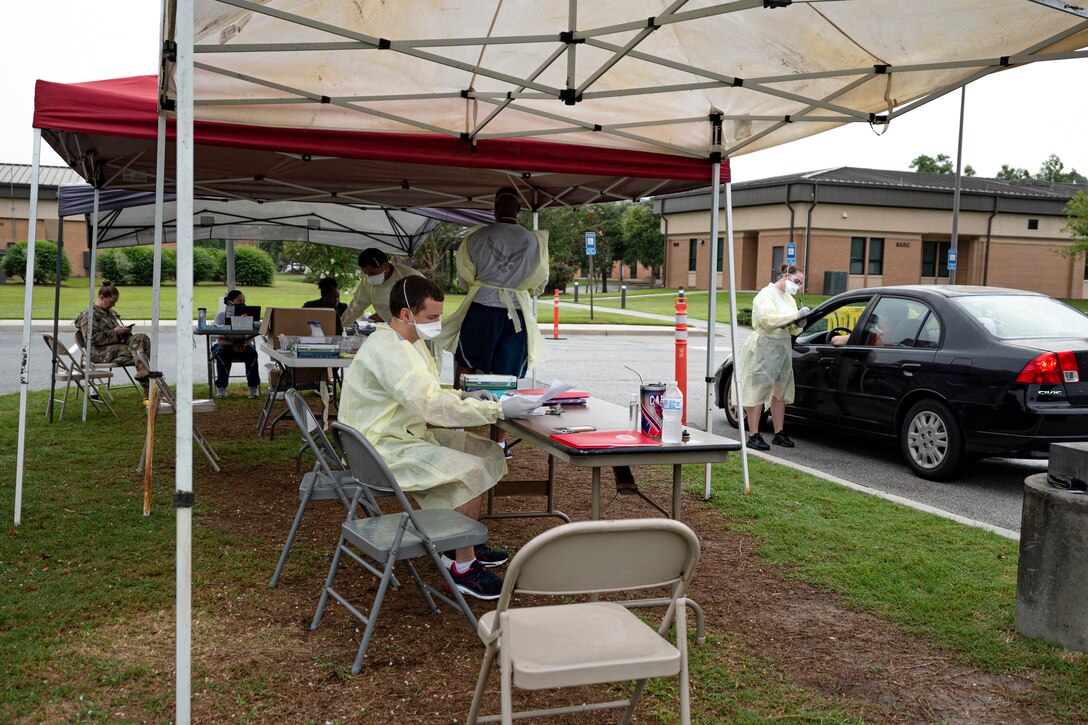 A photo of Airmen screening patients for COVID-19