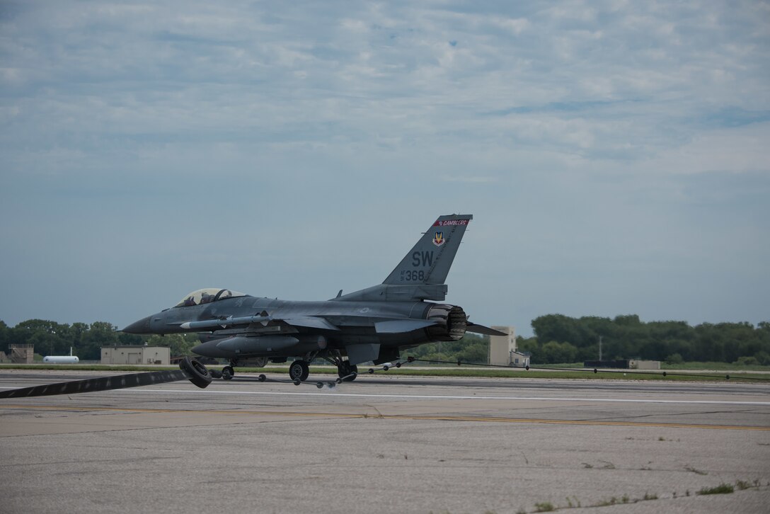 Capt. Henry “Tank” Martin, 77th Fighter Squadron F-16 Fighting Falcon pilot from Shaw Air Force Base, South Carolina, engages the mobile aircraft arresting system Aug. 6, 2020, at McConnell Air Force Base, Kansas. The MAAS was tested to qualify McConnell AFB as the alternate runway for inflight emergencies for assets supporting the multi-national joint exercise Jaded Thunder 2020. (U.S. Air Force photo by Airman 1st Class Marc A. Garcia)