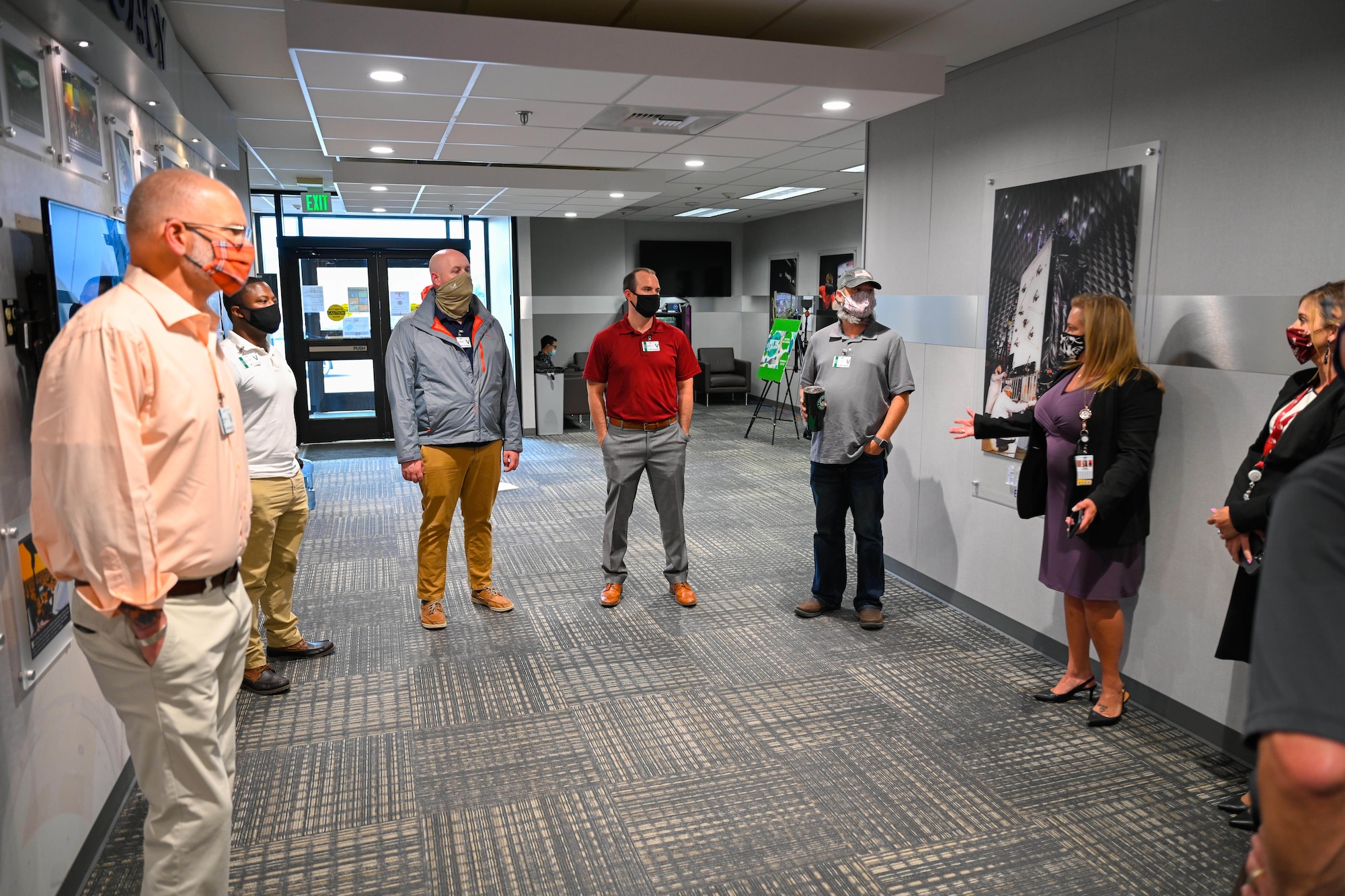 Airmen from the 2nd Space Operations Squadron gather in the lobby of Lockheed Martin prior to their GPS III tour at the manufacturing facility Aug. 6, 2020 in Littleton, Colorado. The tour provided Airmen with details about how the GPS III operates, the launch process and the different procedures satellites endure to ensure units are ready to launch. (Courtesy photo)