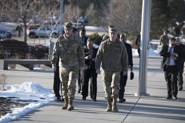 Air Force general gestures while briefing reporters.