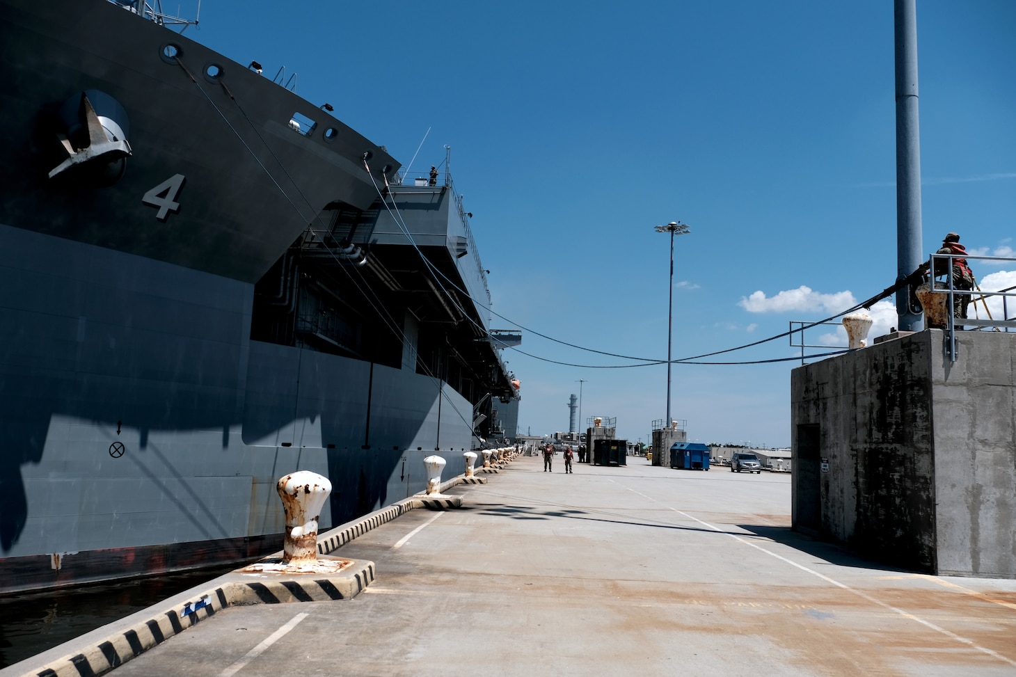 NORFOLK, Va. (July 27, 2020) Sailors perform line handling duties as USS Hershel “Woody” Williams (ESB 4) departs Naval Station Norfolk, Va. for deployment. Williams is conducting its inaugural deployment following its commissioning in March. (U.S. Navy photo by Mass Communication Specialist 1st Class Joshua D. Sheppard)