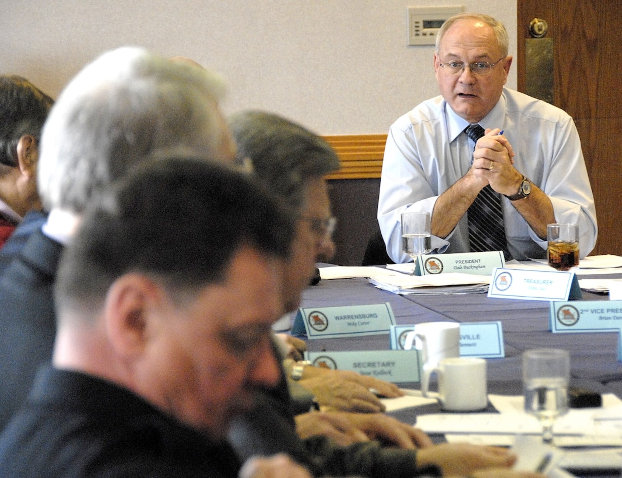 Whiteman Base Community Council president, and retired Air Force Chief Master Sergeant, Dale Buckingham, asks a question during a BCC executive board meeting March 6 here. The BCC is one of four primary civic organizations that support the base, its mission, Airmen and military families. The other three are the Whiteman-Area Leadership Council, the Warrensburg Chamber of Commerce's Military Affairs Committee and the Sedalia Chamber of Commerce's Military Affairs Committee. The mission of all four groups is to support Whiteman Air Force Base, and by extension, the 442nd Fighter Wing. (U.S. Air Force photo  by Maj. David Kurle)