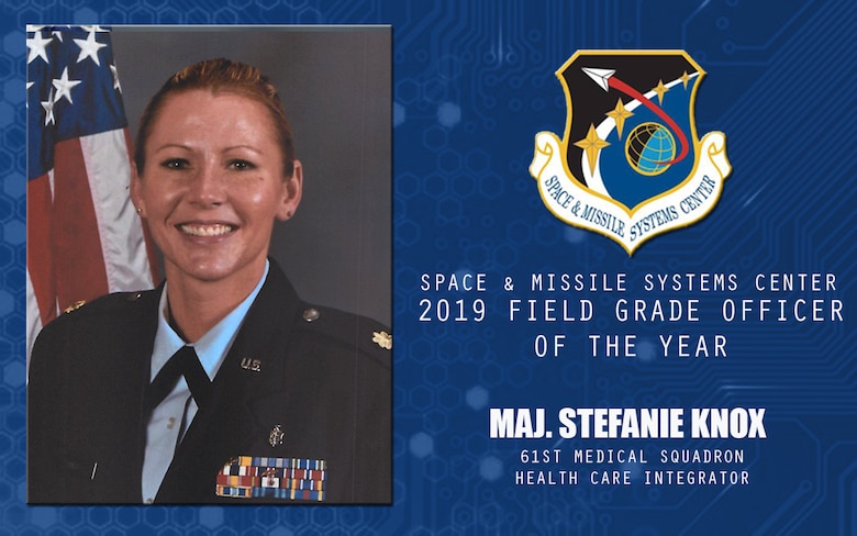 U.S. Air Force Maj. Stefanie Knox, 61st Medical Squadron Health Care integrator and Medical Management director, is selected the 2019 Space and Missile Systems Center Field Grade Officer of the Year at Los Angeles Air Force Base, California, April 17, 2020. Knox received the major command’s lowest non-mission capability percentage, at six percent, by expediting profile processing and streamlining the medical notes retrieval process. (U.S. Air Force Graphic by Chip Pons)