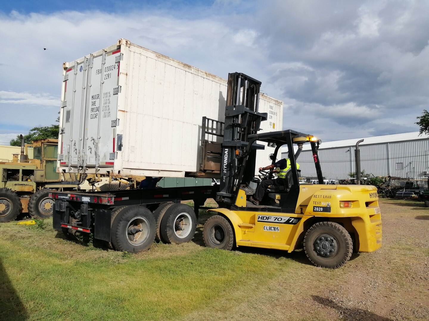 Javier Rios, a contractor employee supporting the Army, operates a forklift July 15 at Soto Cano Air Base to help move items being provided for humanitarian aid in Honduras during the COVID-19 pandemic