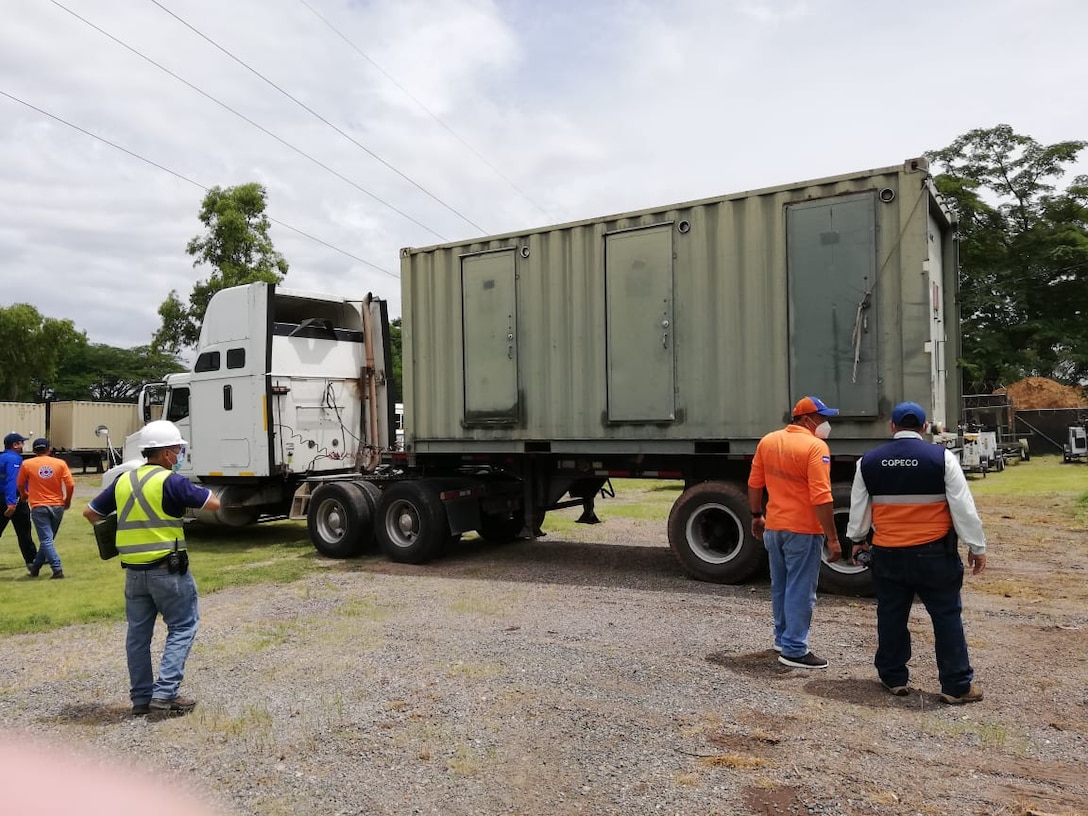 Honduran Disaster Response Agency employees accept more humanitarian materials at Soto Cano Air Base July 27. The items were provided for support during the COVID-19 pandemic.