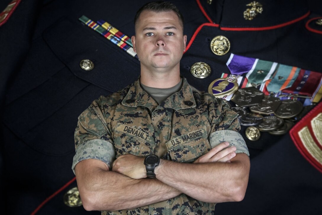 U.S. Marine Gunnery Sgt. Frank Denault, the chief instructor for Infantry Unit Leader Course, Advanced Infantry Training Battalion, School of Infantry - West, poses for a studio portrait in 22 Area on Marine Corps Base Camp Pendleton, California, Aug. 5, 2020. Denault earned his Purple Heart for events that occurred in Sangin, Afghanistan, November 2010. Denault is a native of Kankakee, Illinois. (U.S. Marine Corps photo illustration by Lance Cpl. Alison Dostie)