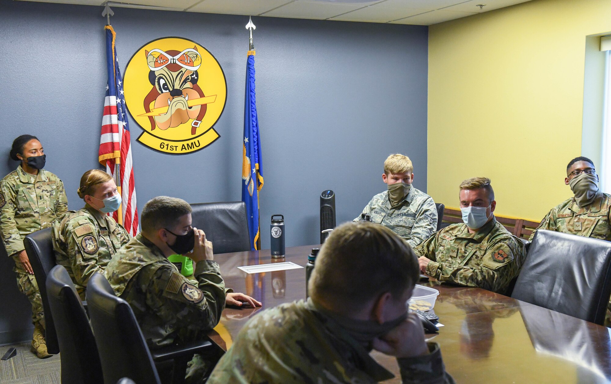 Jarmel Bell, 56th Fighter Wing Violence Prevention Integrator, center, leads a discussion at the 61st Aircraft Maintenance Unit during the “Just Breathe” course Aug. 10, 2020, at Luke Air Force Base, Ariz.