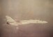 An F-14 flies over the Nevada Test and Training Range.