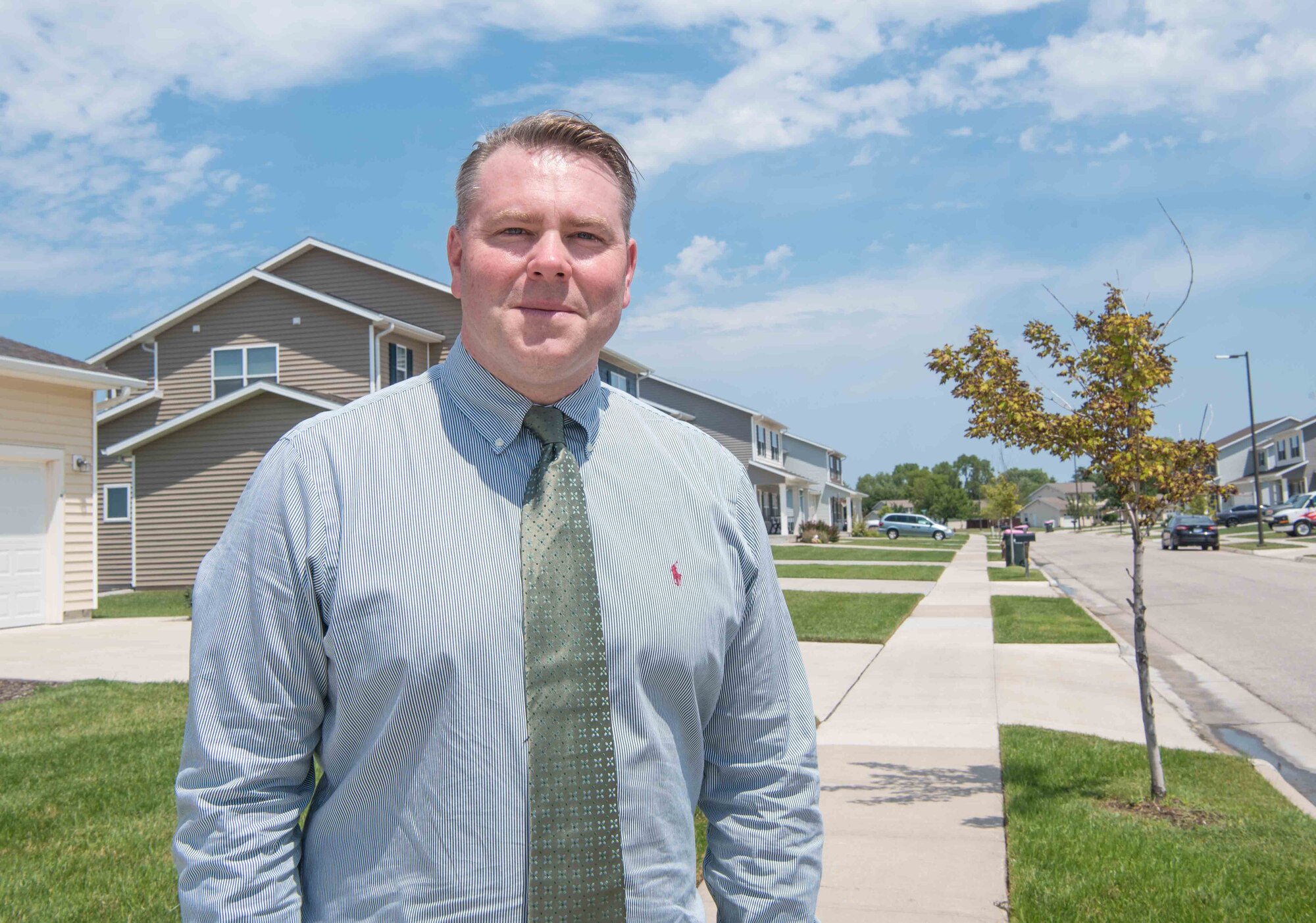 Mr. Robert Wagner, 22nd Wing Staff Agencies privatized housing resident advocate, bridges the gap between privatized housing and military residents Aug. 11, 2019, at McConnell Air Force Base, Kansas. The Department of the Air Force established these advocates after the signing of the Military Housing Privatization Initiative Tenant Bill of Rights, ensuring on-base residents are receiving quality housing. There are 59 Air Force installations receiving advocates to help ensure proper treatment of military families living on base. (U.S. Air Force photo by Senior Airman Alexi Bosarge)