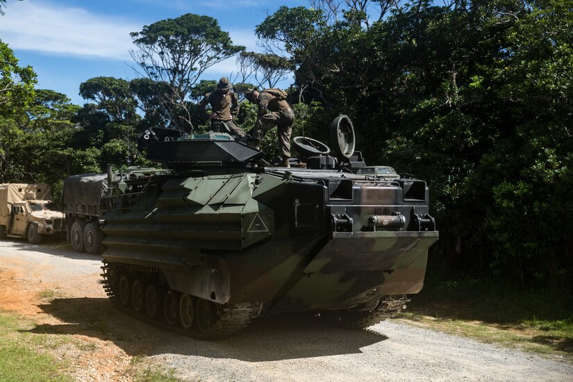 Marines prepare an assault amphibious vehicle.