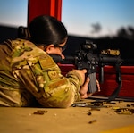 Staff Sgt. Christina Richards, 149th Security Forces Squadron, Air National Guard, shoots her weapon from the prone position at a firing range at Joint Base San Antonio-Chapman Annex Aug. 12.