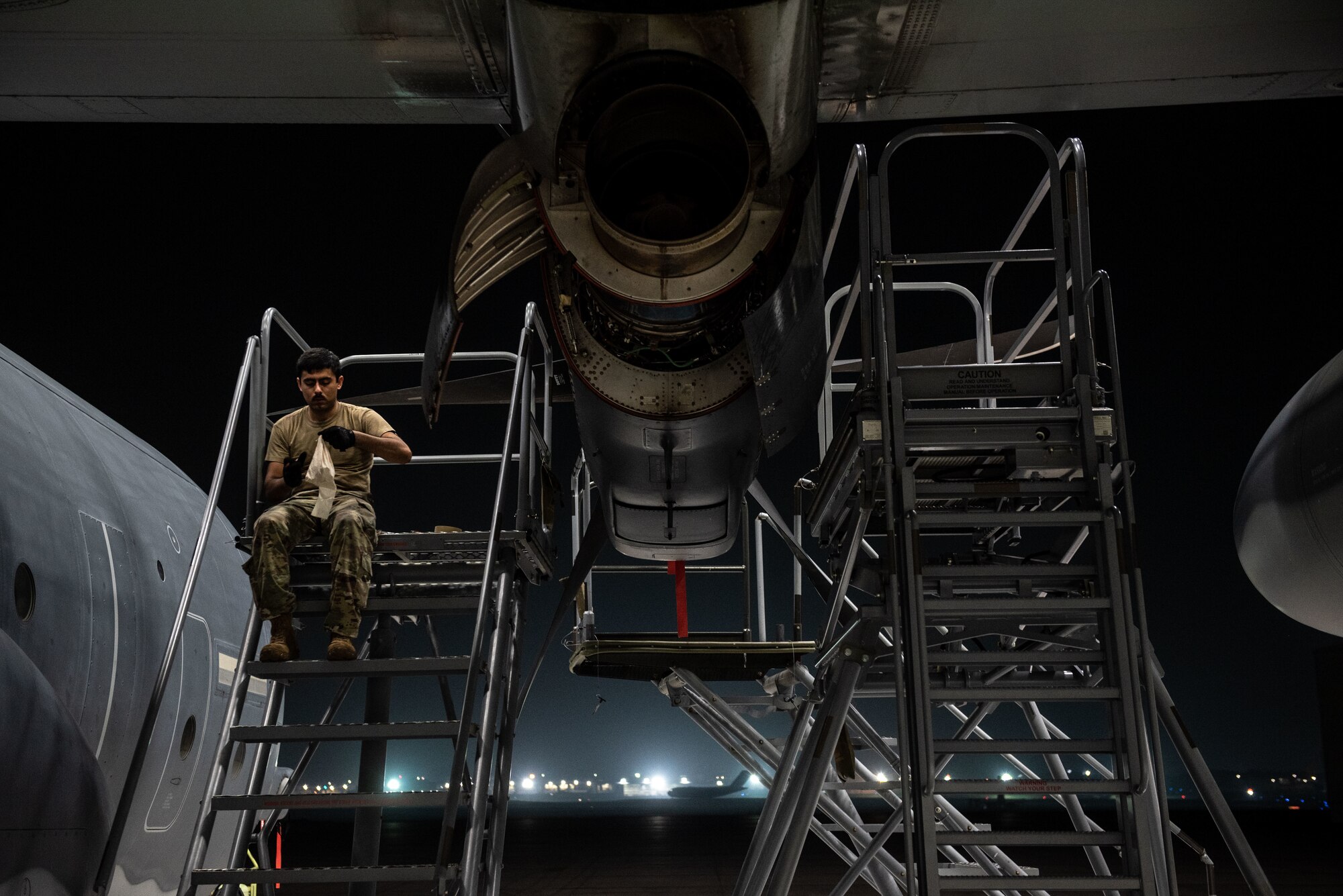 irmen from the 353rd Special Operations Aircraft Maintenance Squadron perform engine maintenance on an MC-130J Commando II Aug. 6, 2020, at Kadena Air Base, Japan.