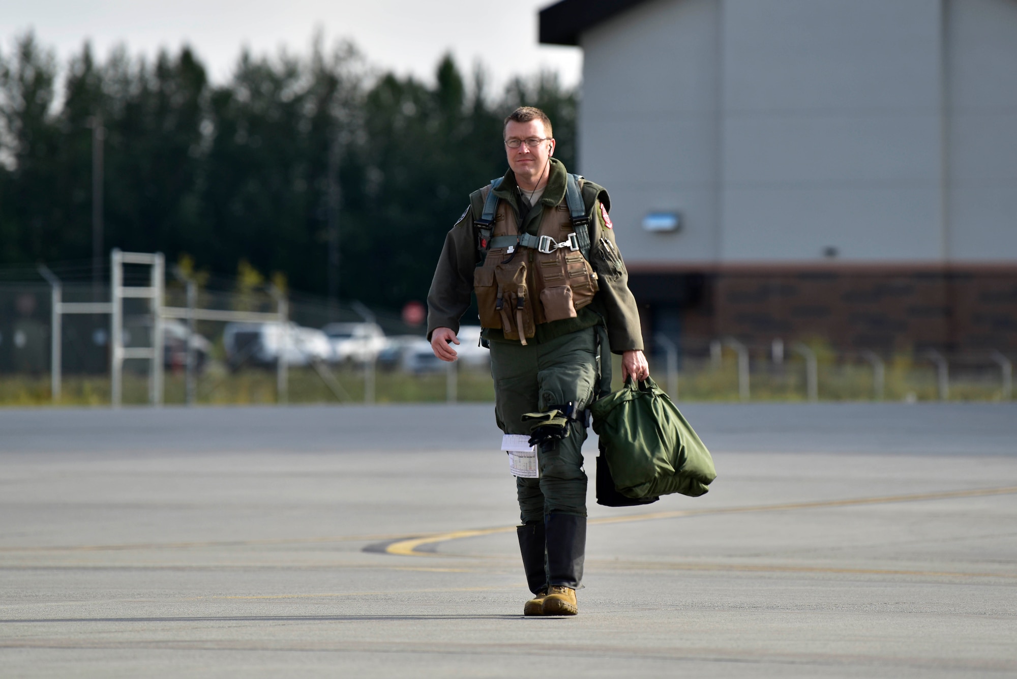 U.S. Air Force Col. Shawn E. Anger, the 354th Fighter Wing commander, steps to an F-16 Fighting Falcon assigned to the 18th Aggressor Squadron on Eielson Air Force Base, Alaska, Aug. 13, 2020. Anger assumed command of the wing in May 2020. (U.S. Air Force photo by Senior Airman Beaux Hebert)