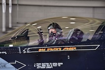U.S. Air Force Col. Shawn E. Anger, the 354th Fighter Wing commander, renders the 18th Aggressor Squadron ‘have at you’ gesture during his fini flight at Eielson Air Force Base, Alaska, Aug. 13, 2020. Anger is a command pilot with more than 2,900 hours flight hours throughout his career. (U.S. Air Force photo by Senior Airman Beaux Hebert)