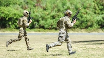 Airmen from the 25th Air Support Operations Squadron conduct field training exercises at Bellows Air Force Station, Hawaii, July 29, 2020. Airmen were evaluated on communication skills and tactical movements in a simulated combat environment. (U.S. Air Force photo by Tech. Sgt. Anthony Nelson Jr.)