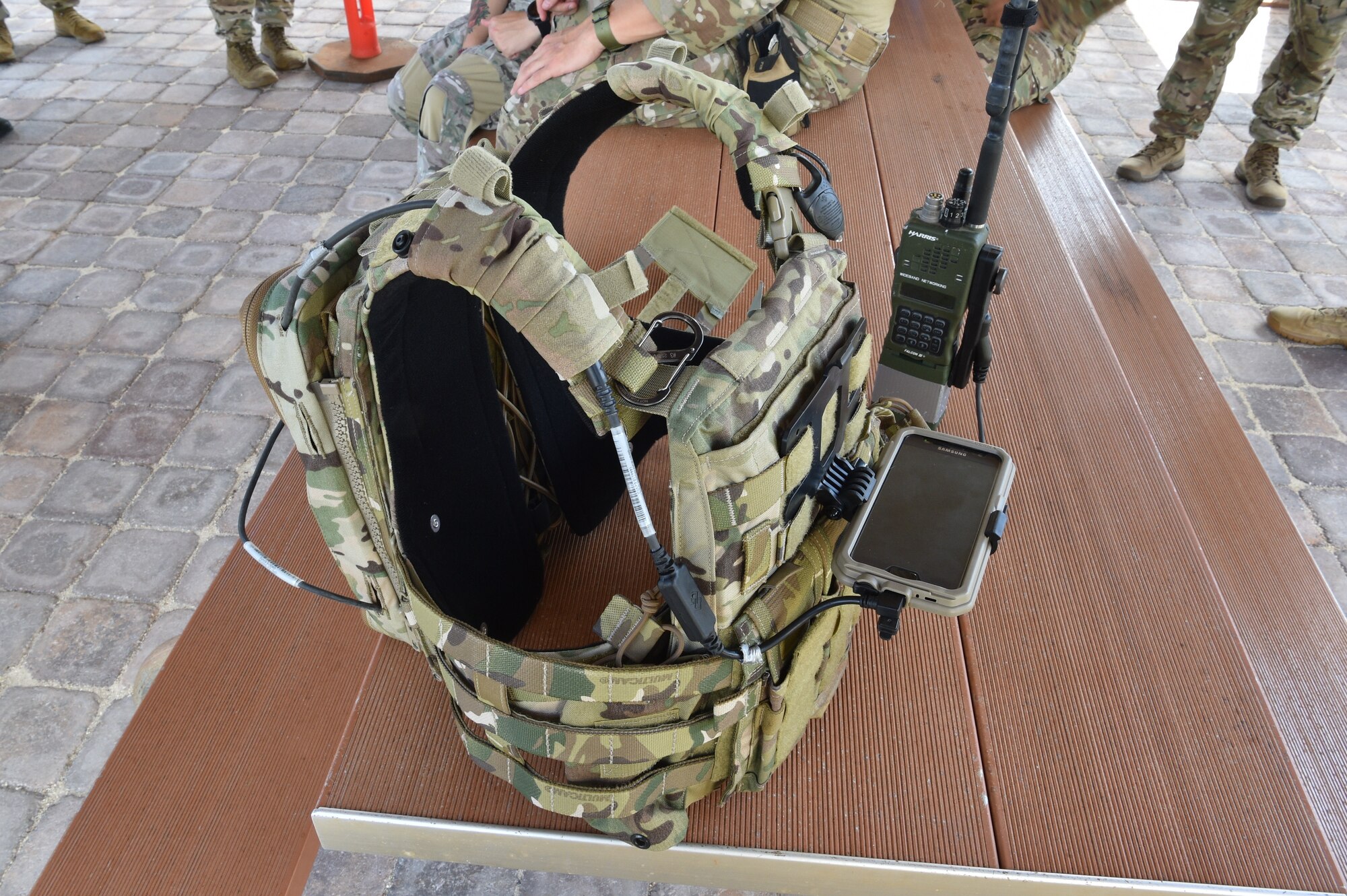 The EvolutionONE GPS and communication system is designed to attach to the body armor worn by servicemembers as shown at Joint Base Pearl Harbor-Hickam, Hawaii, August 4, 2020. Airmen from the 25th Air Support Operation Squadron spent multiple days in different training scenarios to learn how to operate the system. (U.S. Air Force photo by 2nd Lt. Benjamin Aronson)