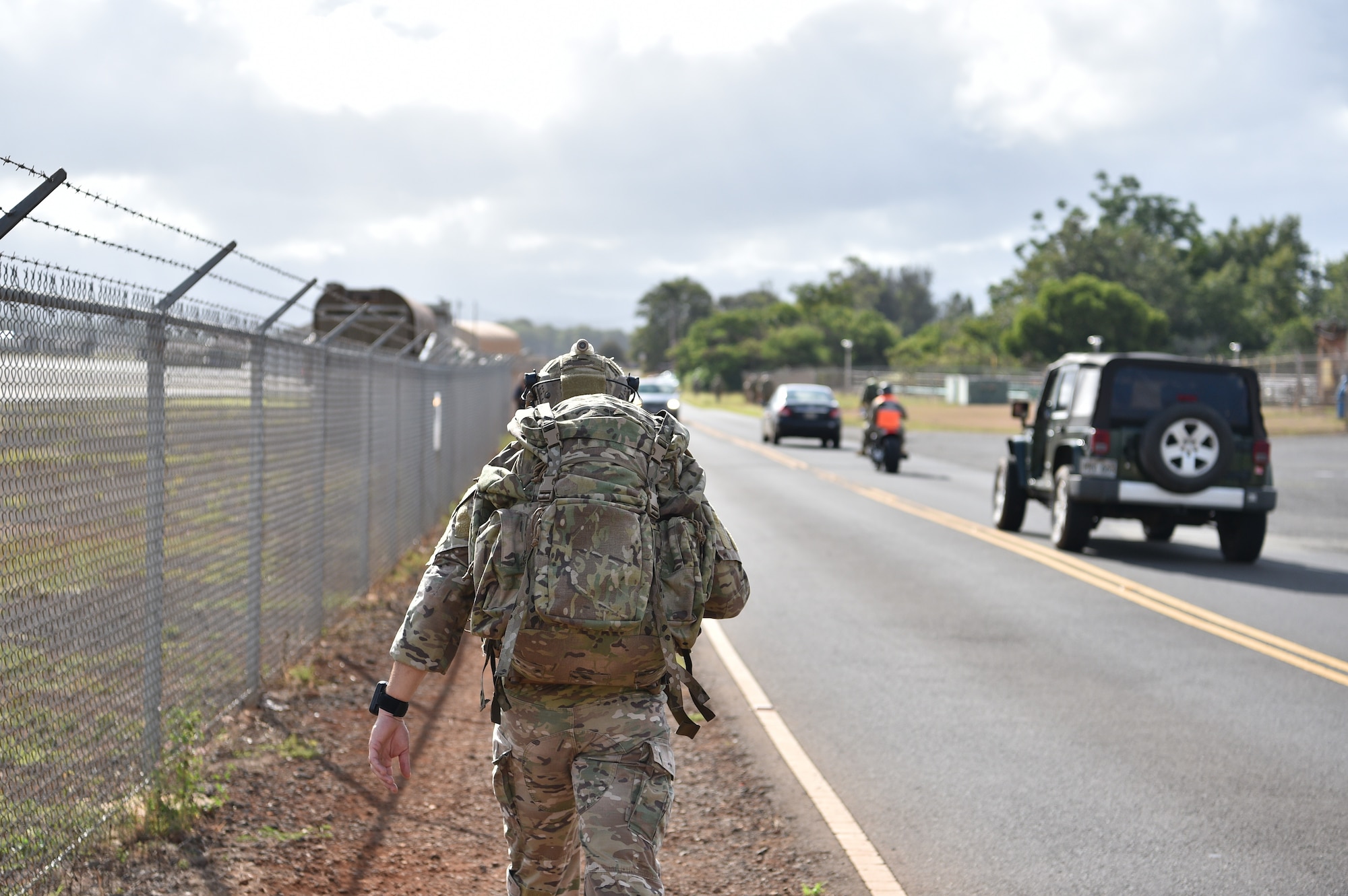 Airmen from the 25th Air Support Operations Squadron perform a three-mile ruck in full gear while stopping at different stations to learn about EvolutionONE, a GPS communication system at Joint Base Pearl Harbor-Hickam, Hawaii, August 5, 2020. This training served as a mid-year assessment of the unit’s innovation tactics. (U.S. Air Force photo by 2nd Lt. Benjamin Aronson)