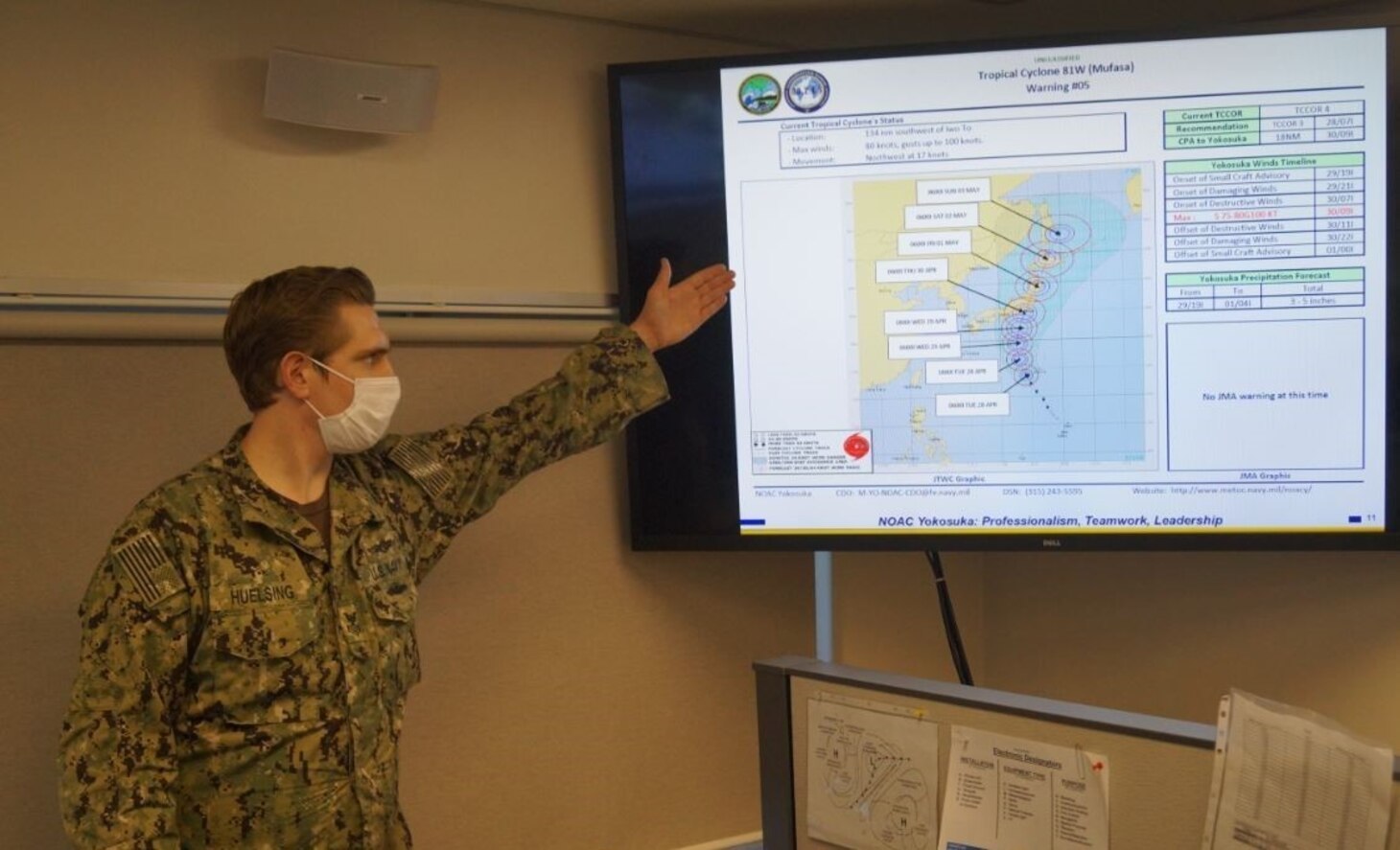 Aerographer's Mate 1st Class Huelsing from the Naval Oceanography Anti-Submarine Warfare Center (NOAC) in Yokosuka, Japan, briefs the Tropical Cyclone Condition of Readiness winds timeline for Commander Fleet Activities Yokosuka (CFAY) as part of the annual Typhoon Ready Reliant Gale (TRRG) exercise on Apr. 26, 2020.
