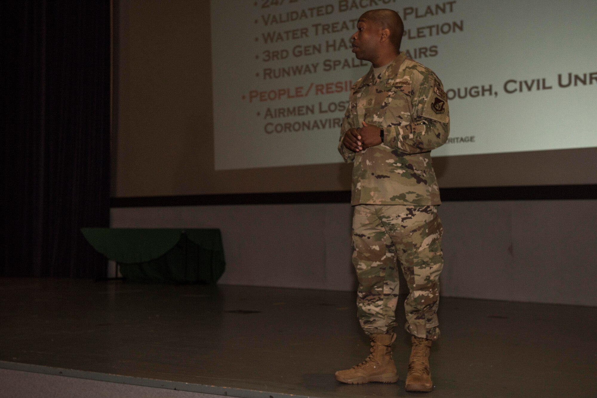 A photo of a command chief speaking.