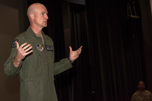 A photo of a commander speaking.